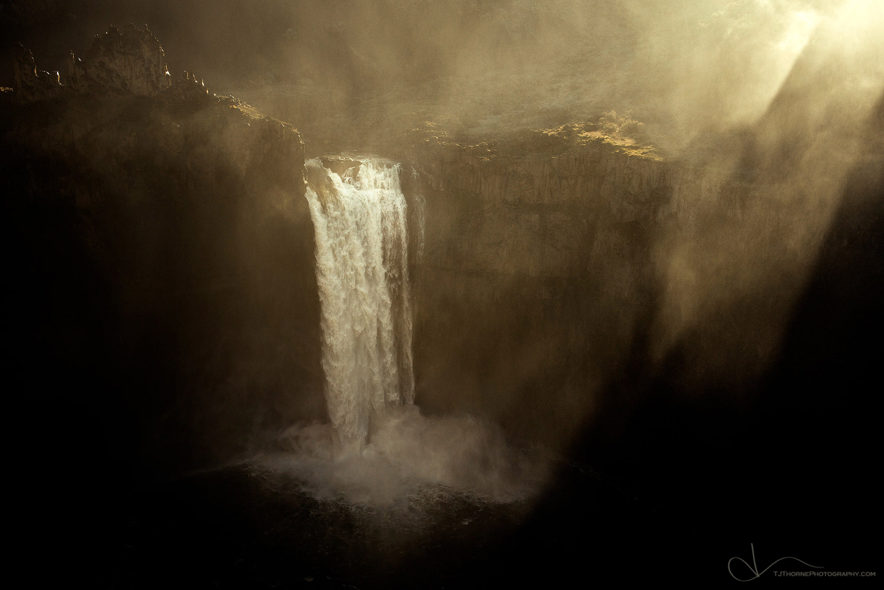 Morning light crests an impressive canyon and lights up the mist generated by Palouse Falls, Washington. Sometimes we don't get...