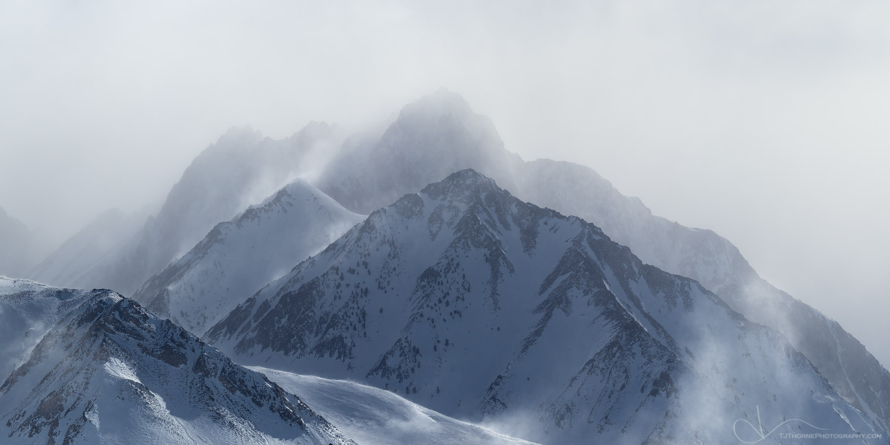 FINE ART LIMITED EDITION OF 100 High winds create snowy spindrift on the ridges of Mount Morrison  in the Eastern Sierra range...